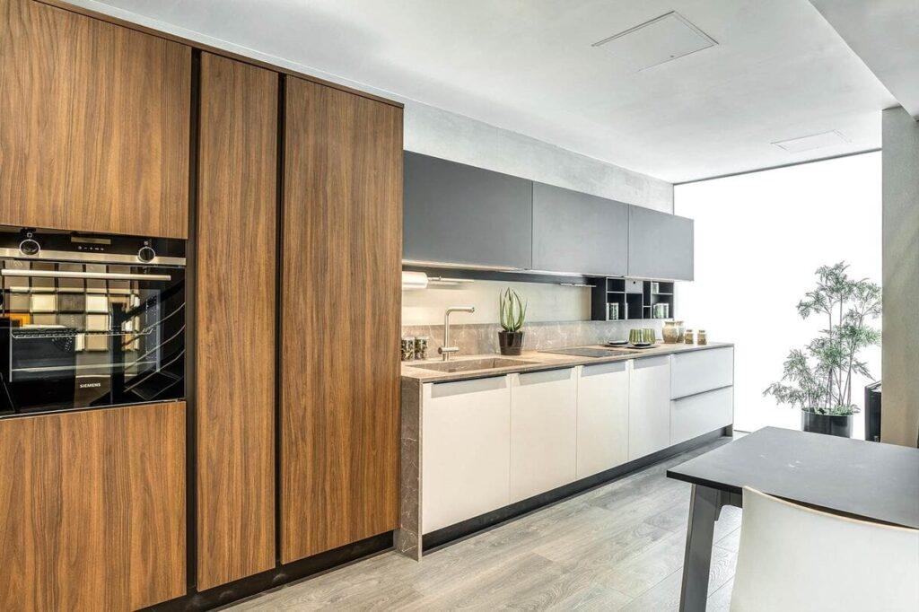 a kitchen with a table and a sink
