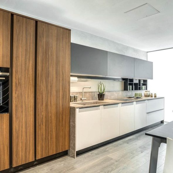a kitchen with a table and a sink