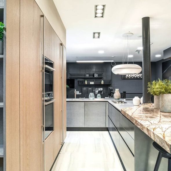 a kitchen with a marble countertop